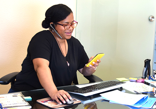 L&L Glass customer support following up via phone on customer satisfaction after the job is completed.