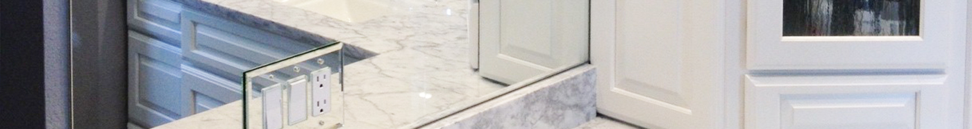 Custom mirror with mirror cut for outlet covers
